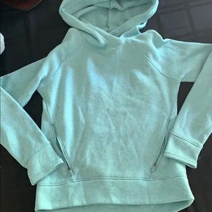 Teal hoodie with zipper pockets